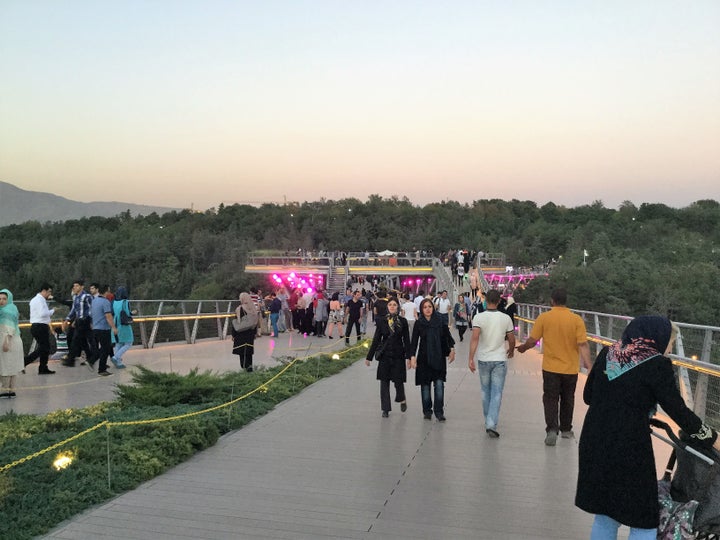 People enjoying a stroll on Tehran’s Tabiat Bridge