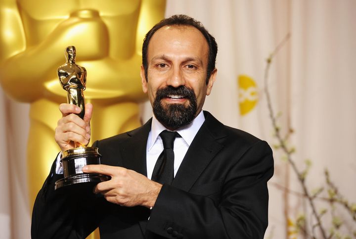 Asghar Farhadi poses with his Academy Award for best foreign language film for