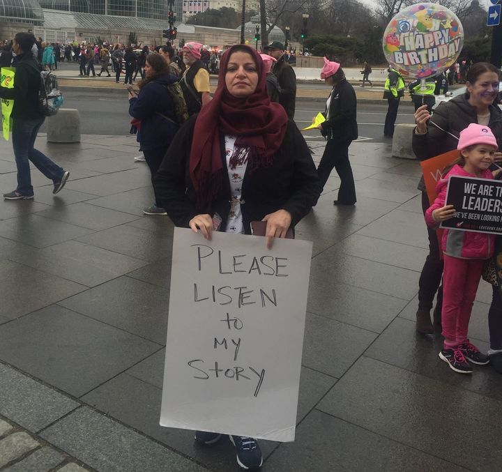 Meathaq attends the Women's March on Washington on Jan. 21, 2017. She is desperate to bring her twin daughters, who are still in Iraq, to the United States.