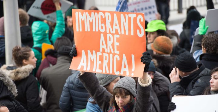 Protesters gather at JFK International Airport's Terminal 4 to demonstrate against President Donald Trump's executive order on January 28, 2017, in New York.