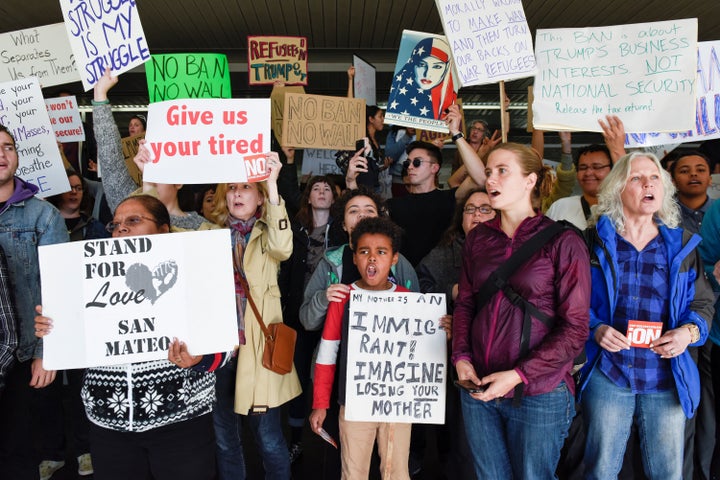 Demonstrators on the road outside Terminal 4 at San Francisco International Airport.