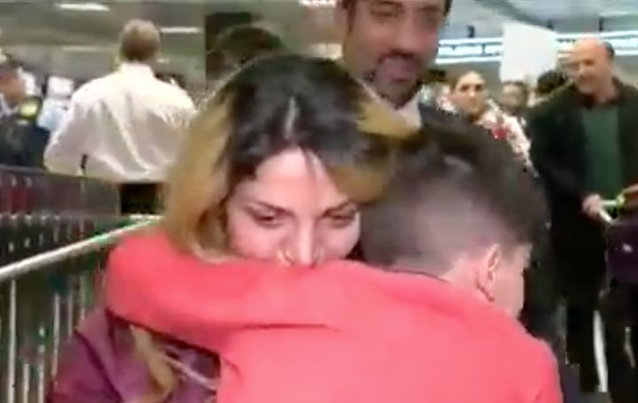 A women has been reunited with her son who was detained for hours at a Washington airport following Trump's latest executive order.