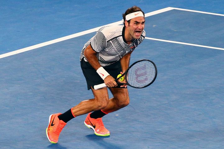Melbourne Park, Melbourne, Australia - 1/29/17 - Switzerland's Roger Federer celebrates winning his Men's singles final match against Spain's Rafael Nadal. (REUTERS/David Gray)