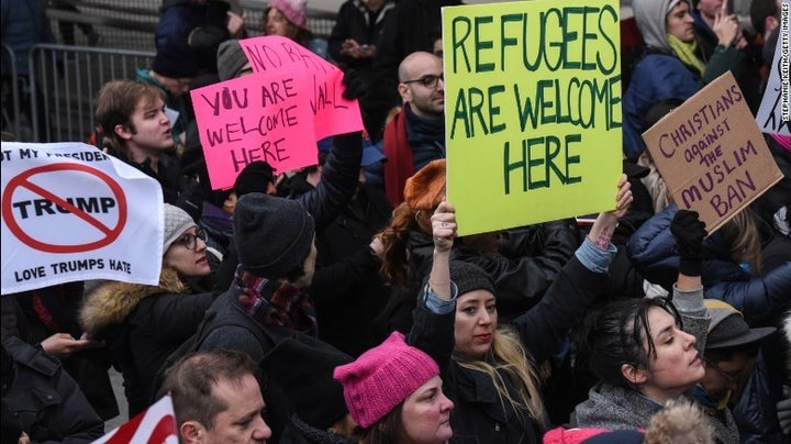 Americans gathered in airports around the country to protest Trump’s order barring refugees and Muslim immigrants.