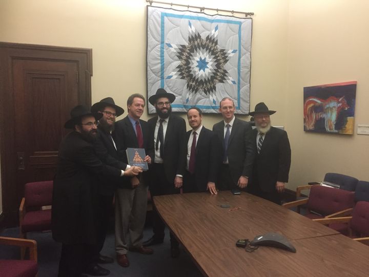 A delegation of rabbis presenting Governor Steve Bullock of Montana with a Chumash