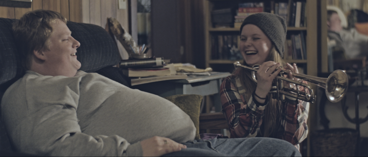 Tom (Merrick Robison) and Rebecca (Madysen Frances) share a laugh in a scene from <strong><em>Empty Space</em></strong>