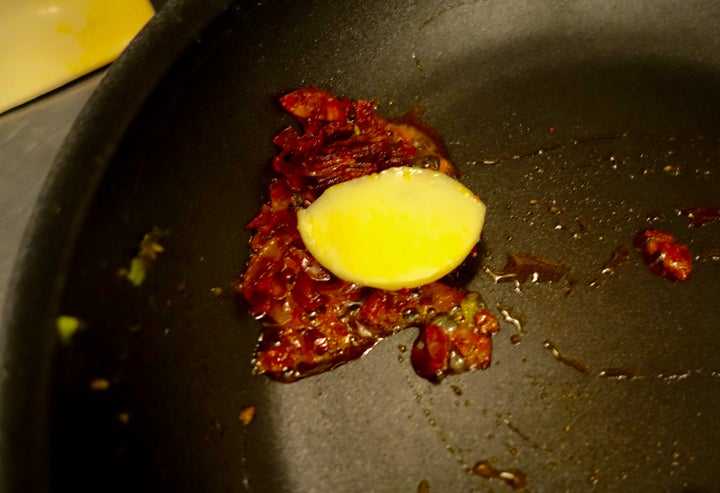 <p>Minced Spanish chorizo and a nice pat of butter</p>