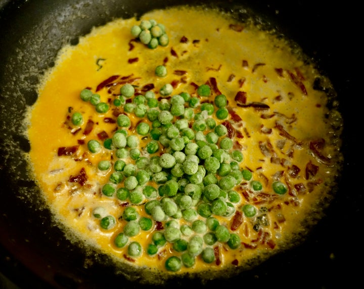 <p>Chorizo-scented (and Chorizo-tinted) cream receives peas right from the freezer</p>