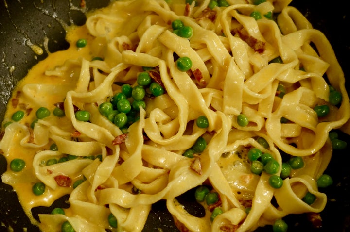<p>Fresh tagliatelle added to the skillet</p>