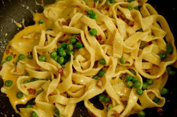 Fresh tagliatelle added to the skillet