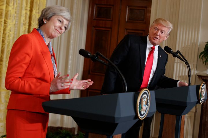 President Donald Trump speaks during a news conference with British Prime Minister Theresa May