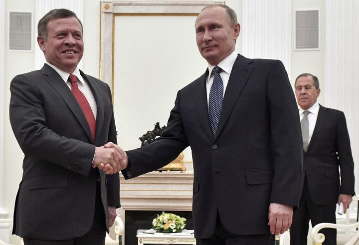 <p>Russian President Vladimir Putin, right, shakes hands with Jordan’s King Abdullah II during their meeting in the Kremlin in Moscow, Russia on January 25, 2017. In the back is Russian Foreign Minister Sergey Lavrov.</p>