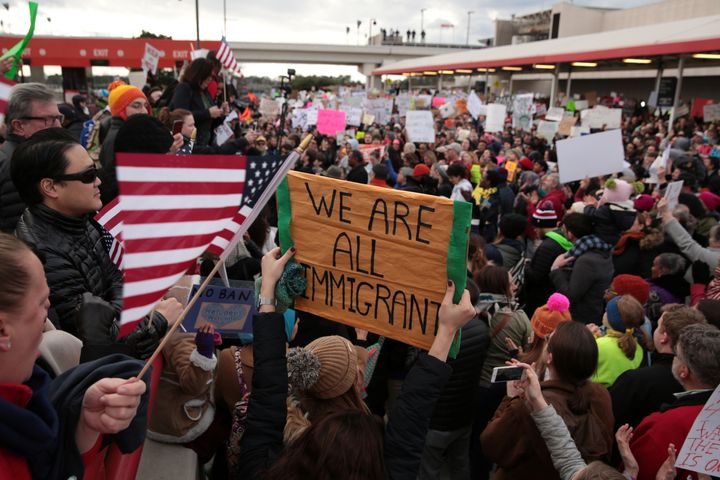 Demonstrators yell slogans during an anti-Donald Trump travel ban protest outside Hatfield-Jackson Atlanta International Airport in Atlanta, Georgia.