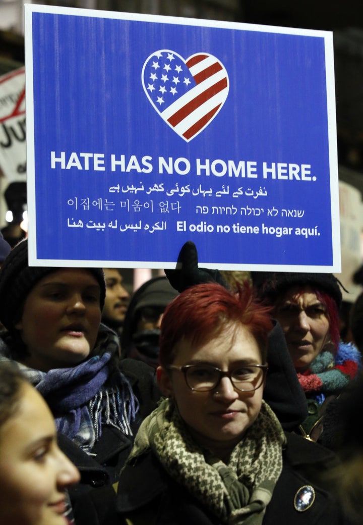 There are many ways you can show solidarity with those affected by the ban; demonstrators converge outside O'Hare Airport in Chicago, above