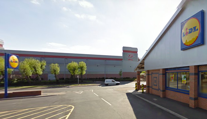 A man has been arrested on suspicion of murdering his wife at a Lidl carpark in Birmingham