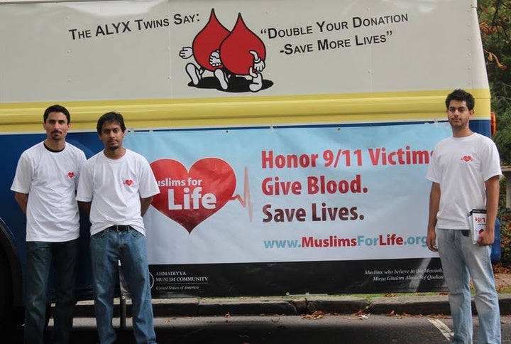 With Muslim youth in front of a blood mobile at one of many blood drives across the country.