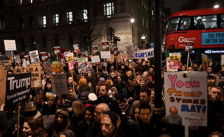 People demonstrate during a protest at Downing Street in central London against US President Donald Trump's controversial travel ban on refugees and people from seven mainly-Muslim countries.