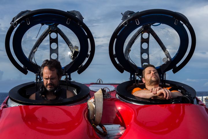 Researchers Fabiano Thompson and Kenneth Jozeph Lowick prepare to descend from the deck of the Greenpeace ship MY Esperanza to explore a new coral reef discovered off the mouth of the Amazon.