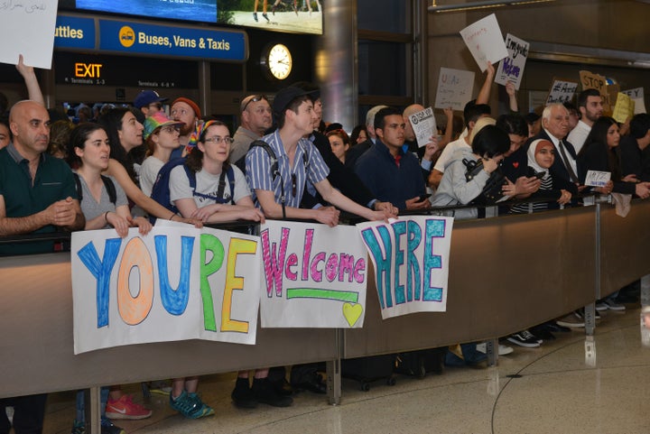 Demonstrators against Trump's Muslim ban come together for a second day of protests at Los Angeles International Airport on Sunday.