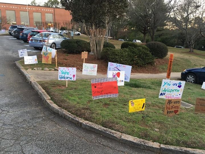 The signs left in front of the International Community School in Decatur, Georgia.