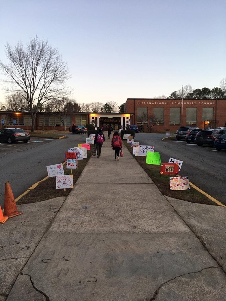 Signs planted by the school’s walkway on Monday morning.