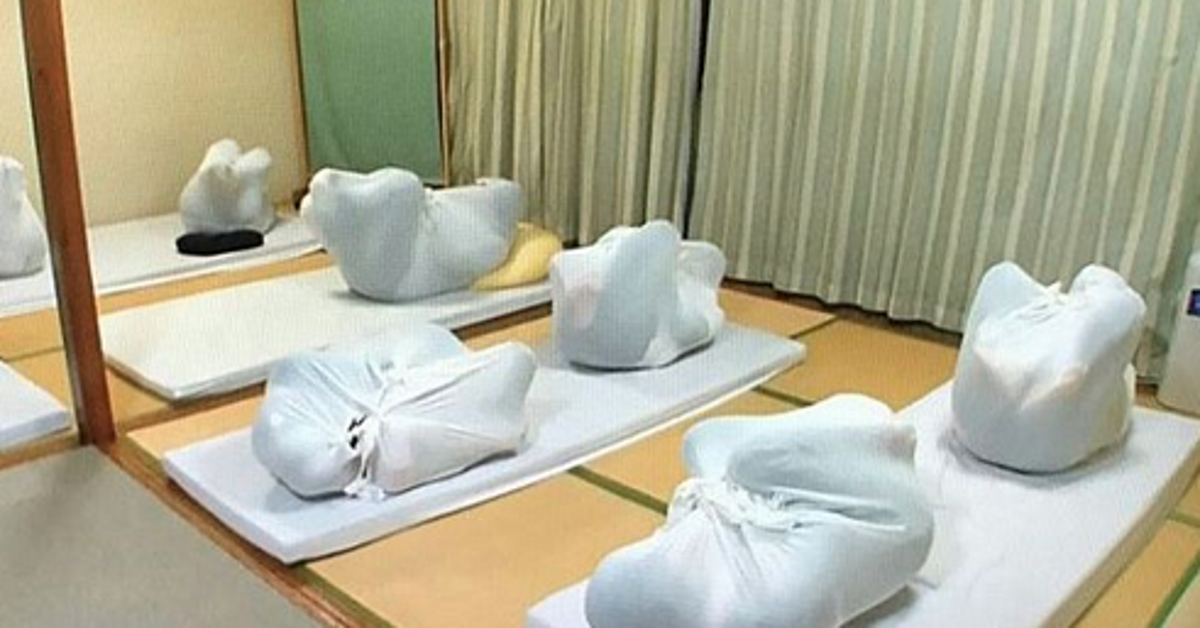 Adult Wrapping People In Japan Are Swaddling Themselves Like Babies To