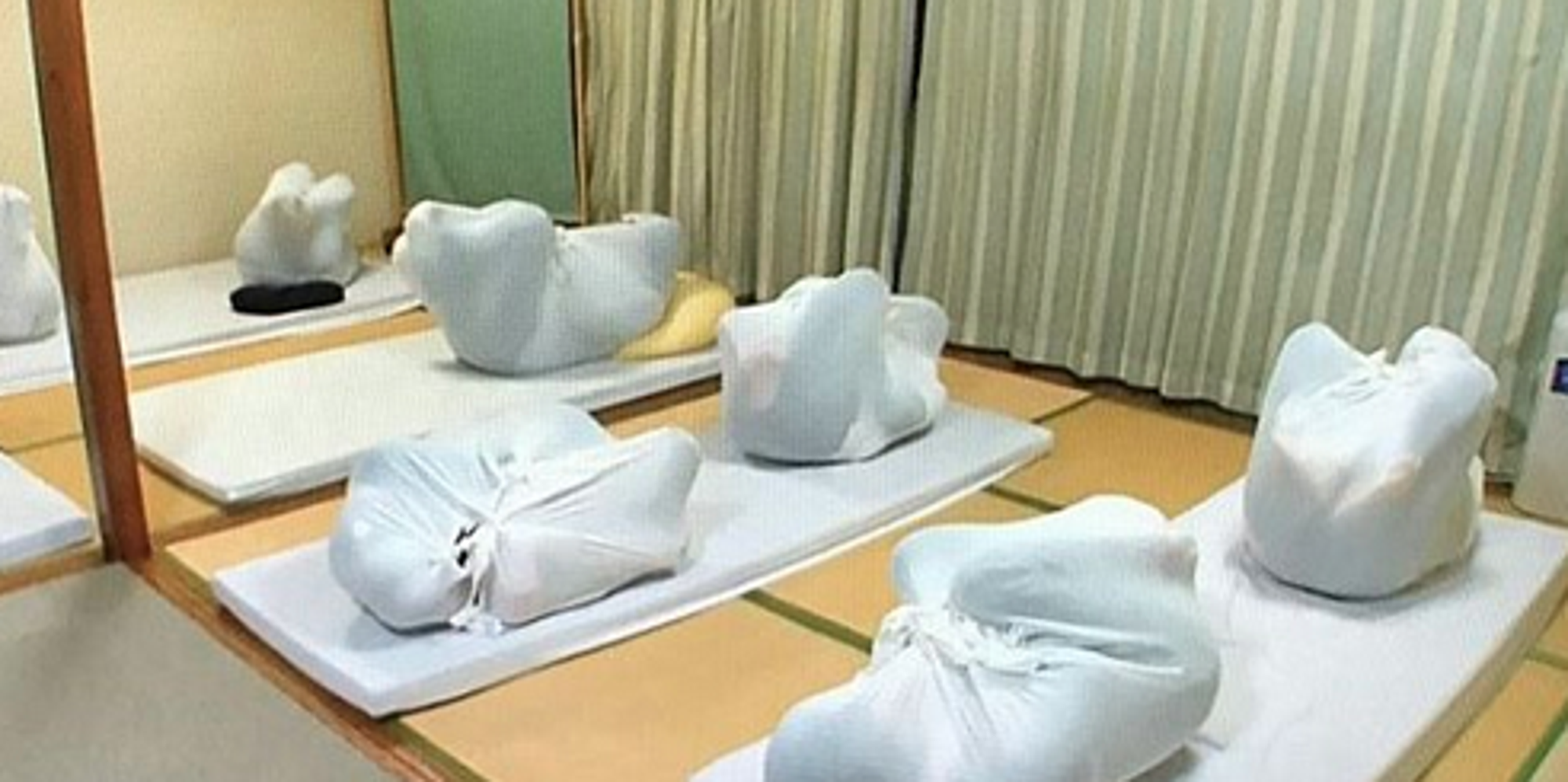Adult Wrapping People In Japan Are Swaddling Themselves Like Babies To