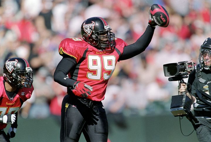 The XFL's trademark red and black football was all part of the league's madness -- it didn't work well when it rained.