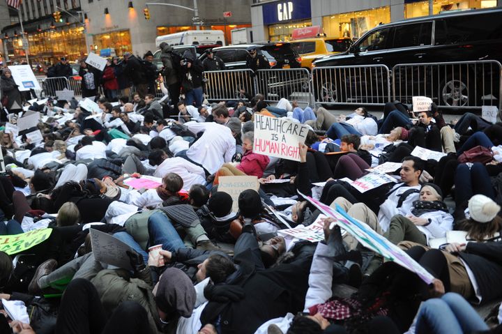 Medical school students in New York City participate in a die-in protest against repealing the Affordable Care Act on Jan. 30, 2017.