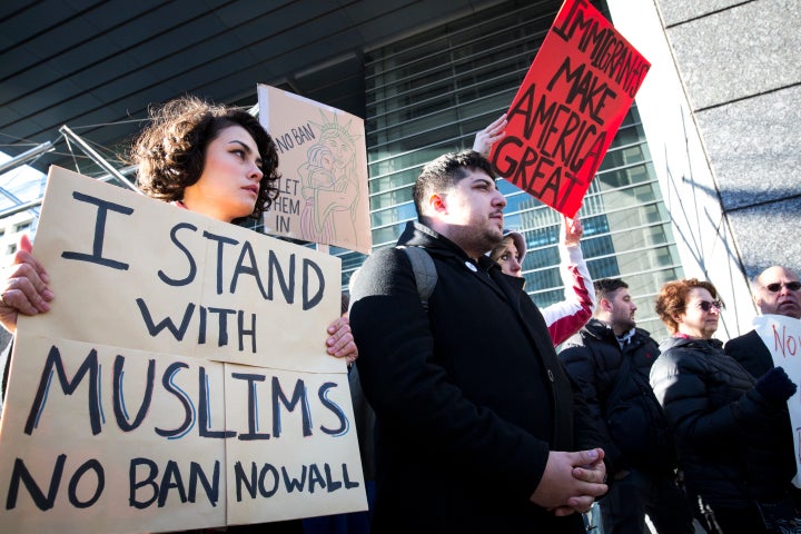 Trump's immigration ban has prompted protests worldwide. Here, foreign residents of Japan are seen protesting the ban near th