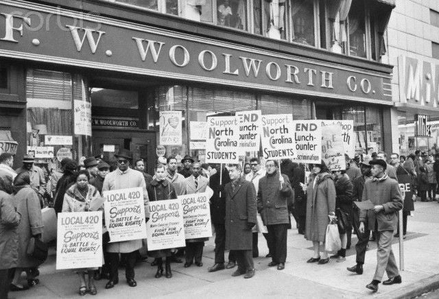 <p>Demonstrators picket outside Woolworths in New York City to support Southern sit-in movement</p>