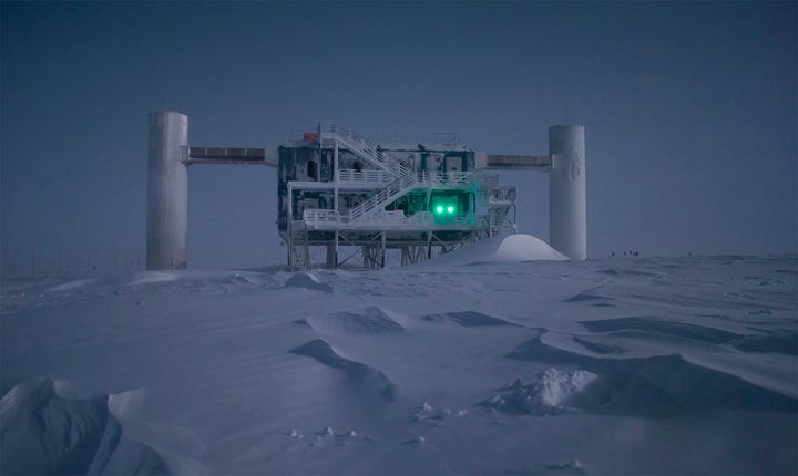 Scientists are using the world's biggest telescope, buried deep under the South Pole, to try to unravel the mysteries of tiny particles known as neutrinos, hoping to shed light on how the universe was made.