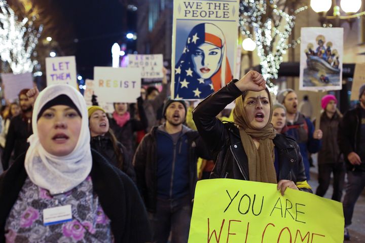 People march through downtown Seattle protesting Trump's travel ban. Jan. 29, 2017.