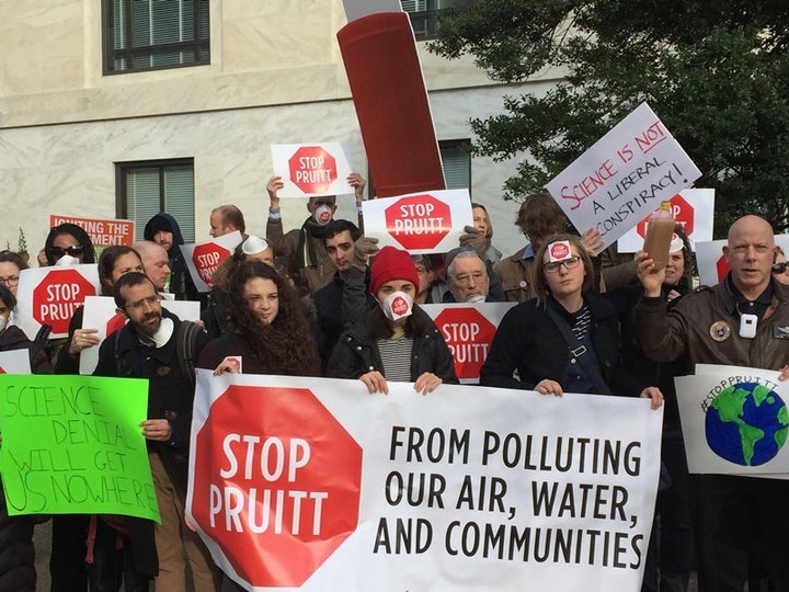 Protesters rally against Scott Pruitt for head of the EPA.