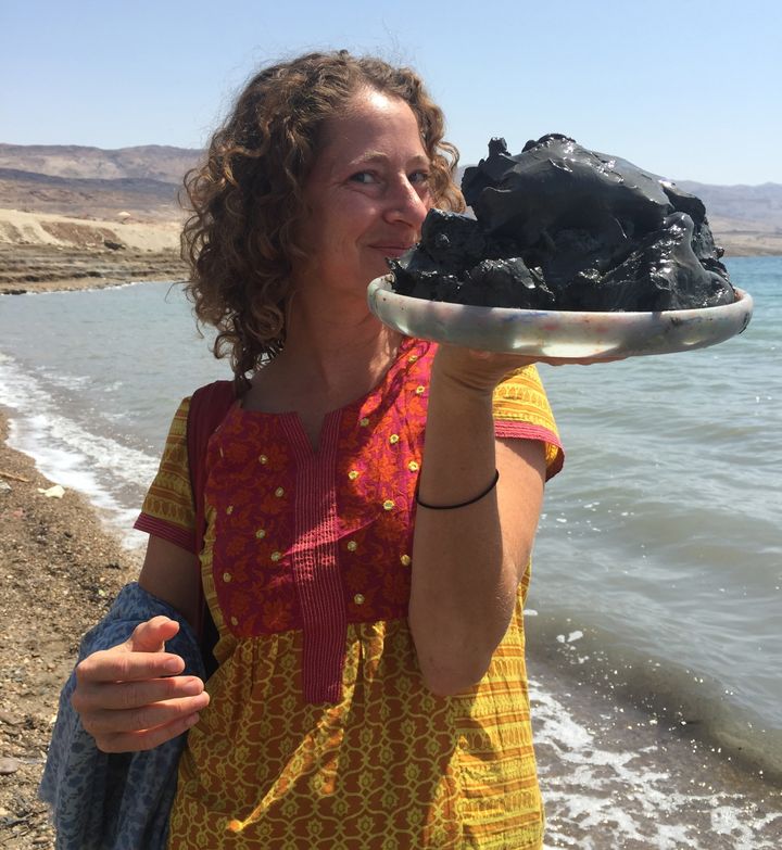 <p>collecting Dead Sea mud, Jordan</p>