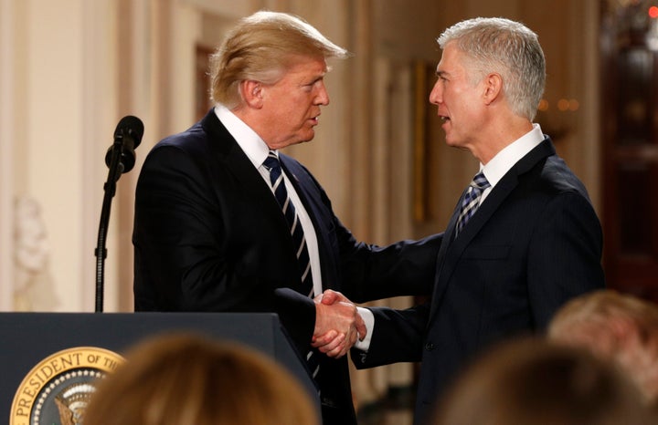 Donald Trump shakes hands with Neil Gorsuch after nominating him to be an associate justice of the U.S. Supreme Court on Jan.