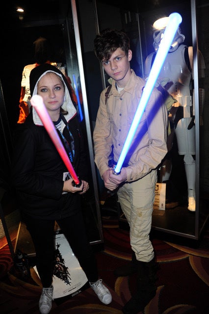 <p>ACTOR TY SIMPKINS AND GUEST AT THE TCL CHINESE THEATRE FOR OPENING NIGHT OF ROGUE ONE: A STAR WARS STORY</p>