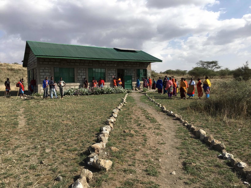 Visiting a nearby school on scholarship day