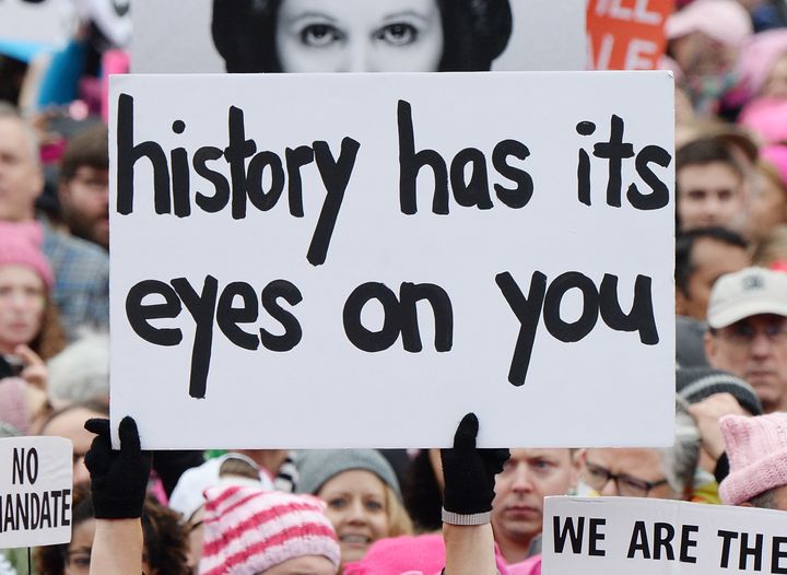 A sign from the Women's March on Washington, which occurred before President Trump signed his executive order restricting refugee and immigrant entry.