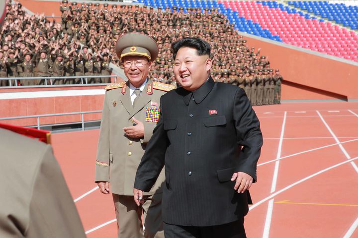 Photo provided by Korean Central News Agency on Oct. 14, 2015 shows top leader of the Democratic People's Republic of Korea Kim Jong Un recently having a photo session with the participants in the military parade celebrating the 70th anniversary of the ruling Workers' Party of Korea in Pyongyang, capital of the Democratic People's Republic of Korea.