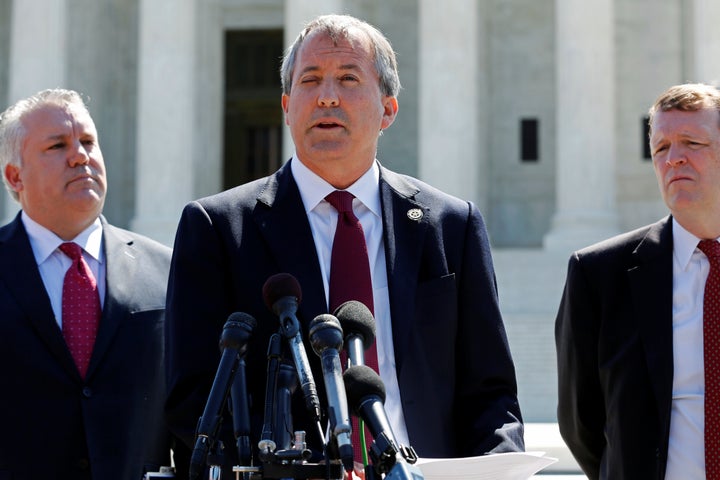 Texas Attorney General Ken Paxton holds a news conference.