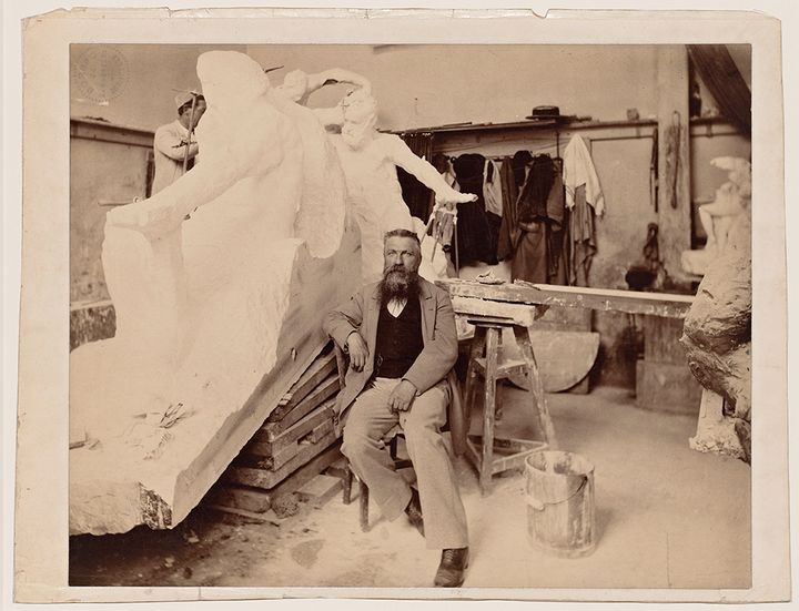 Paul Dornac, Rodin seated in his studio in front of the Monument to Victor Hugo (plaster), c. 1898, proof on albumin paper. © Musée Rodin.