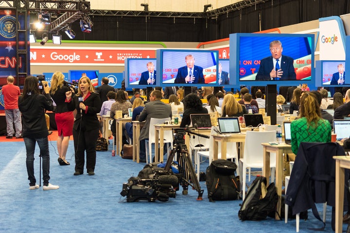 HOUSTON - FEBRUARY 25, 2016: Members of the media watch the RNC debate.