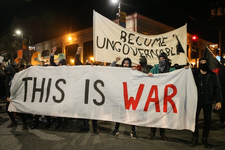 People protesting controversial Breitbart writer Milo Yiannopoulos take to the streets on February 1, 2017 in Berkeley, California.