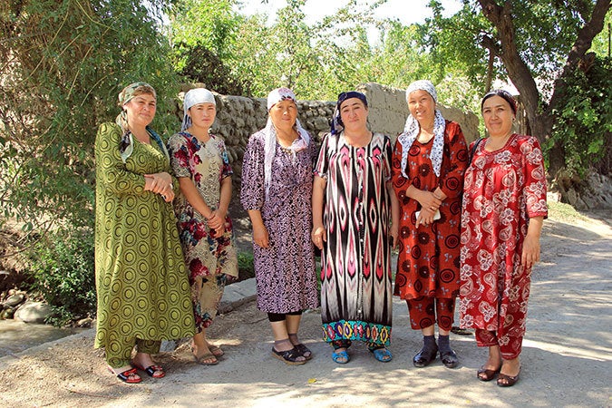  Kyrgyz and Tajik women mediators on the bridge that divides the two countries. Photo: UN Women/Aijamal Duishebaeva 