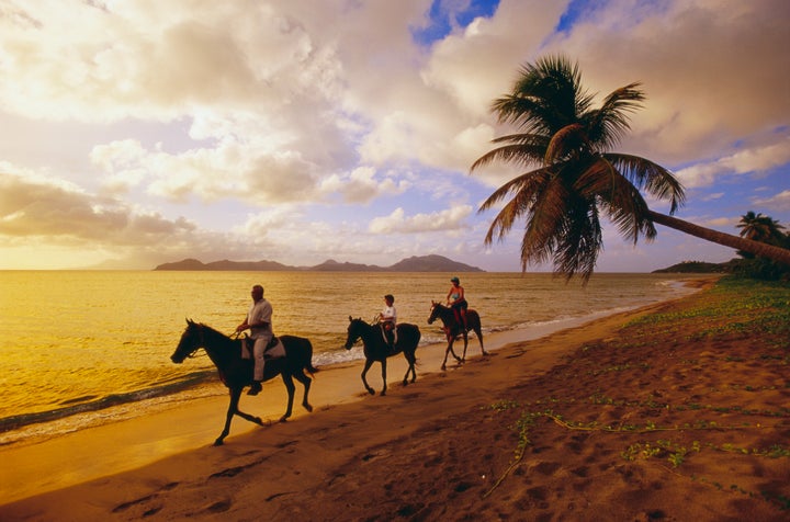 Horseback riding on Pinney's Beach