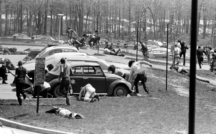 Students dive to the ground May 4, 1970, as Ohio National Guardmen open fire on faculty and students at Kent State University who were protesting the U.S. incursion into Cambodia. Four students were killed and nine injured.