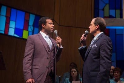 <p>Lance Gardner and Anthony Fusco in a scene from <strong><em>The Christians</em></strong> </p>