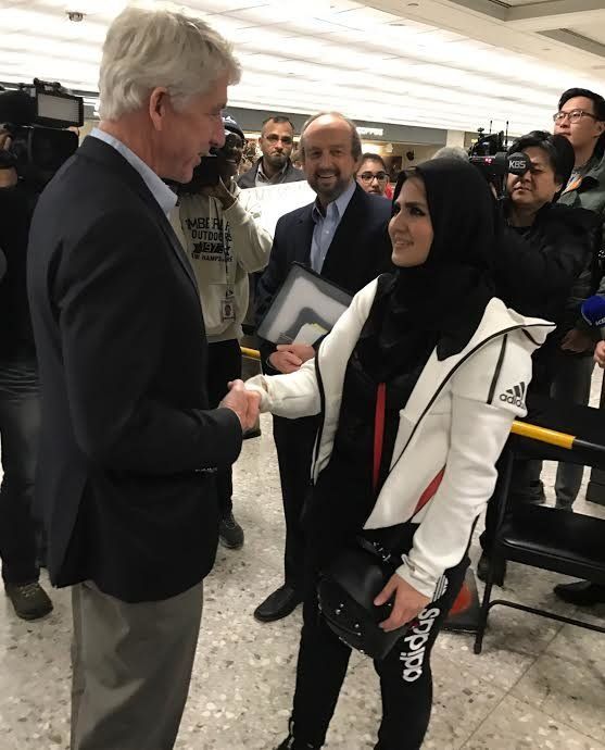 Virginia Attorney General Mark Herring welcomes George Mason University student Najwa Elyazgi, 23, upon her return to the U.S. Elyazgi is a Libyan citizen who was banned from entering the country by President Donald Trump's executive order.