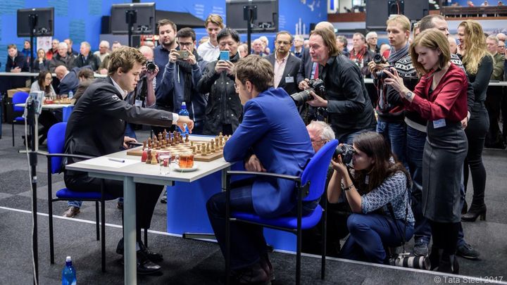 Magnus Carlsen, left, preparing to make his first move against Levon Aronian during the Tata Steel Chess Tournament. 
